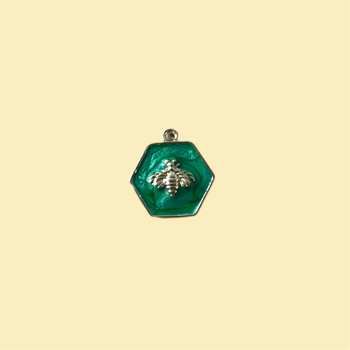 Green charm with bee