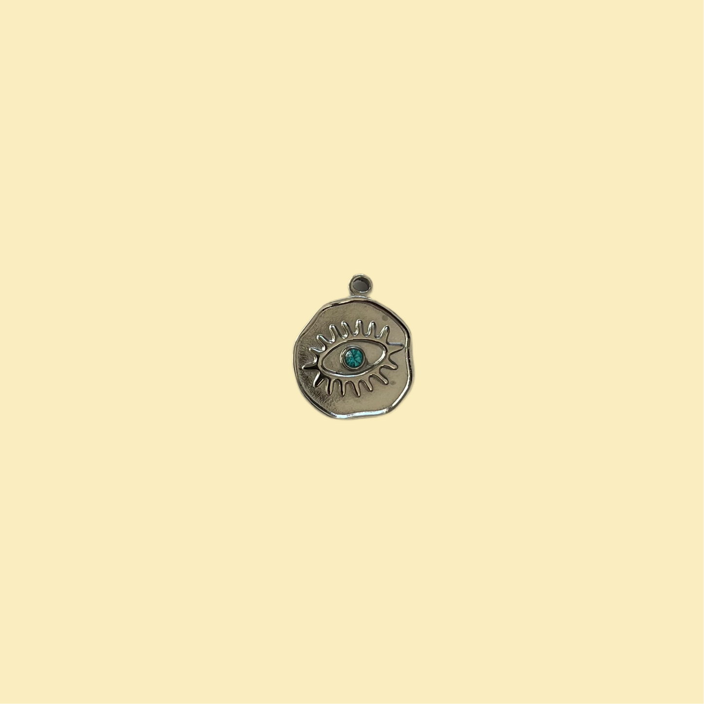 Round charm with eye