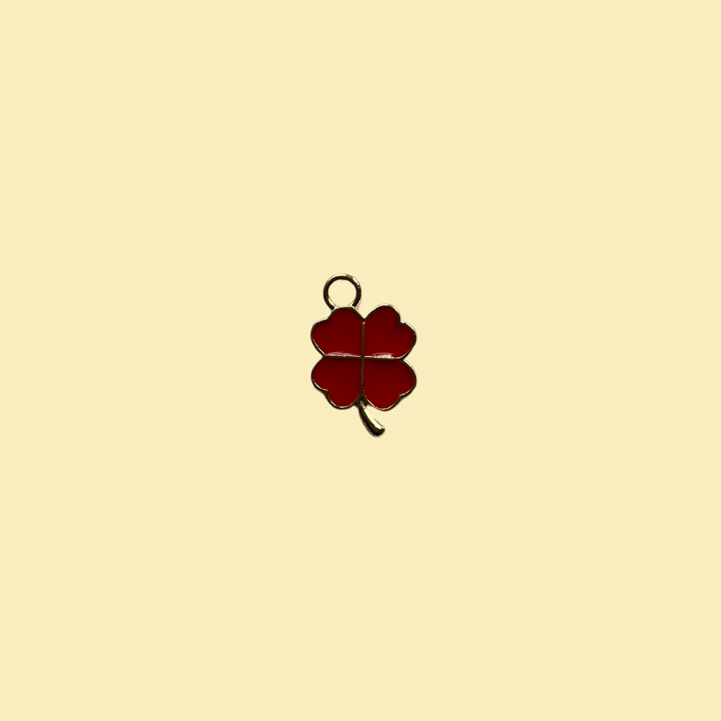 Red four leaf clover charm