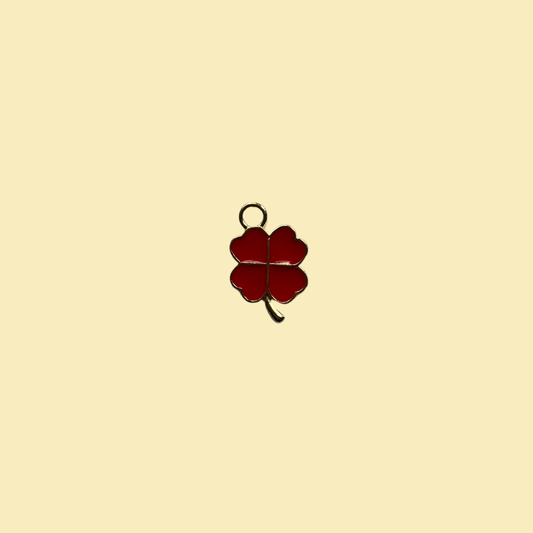 Red four leaf clover charm