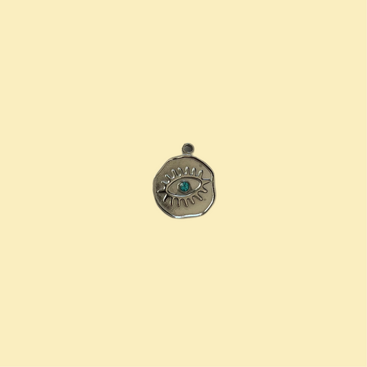 Round charm with eye