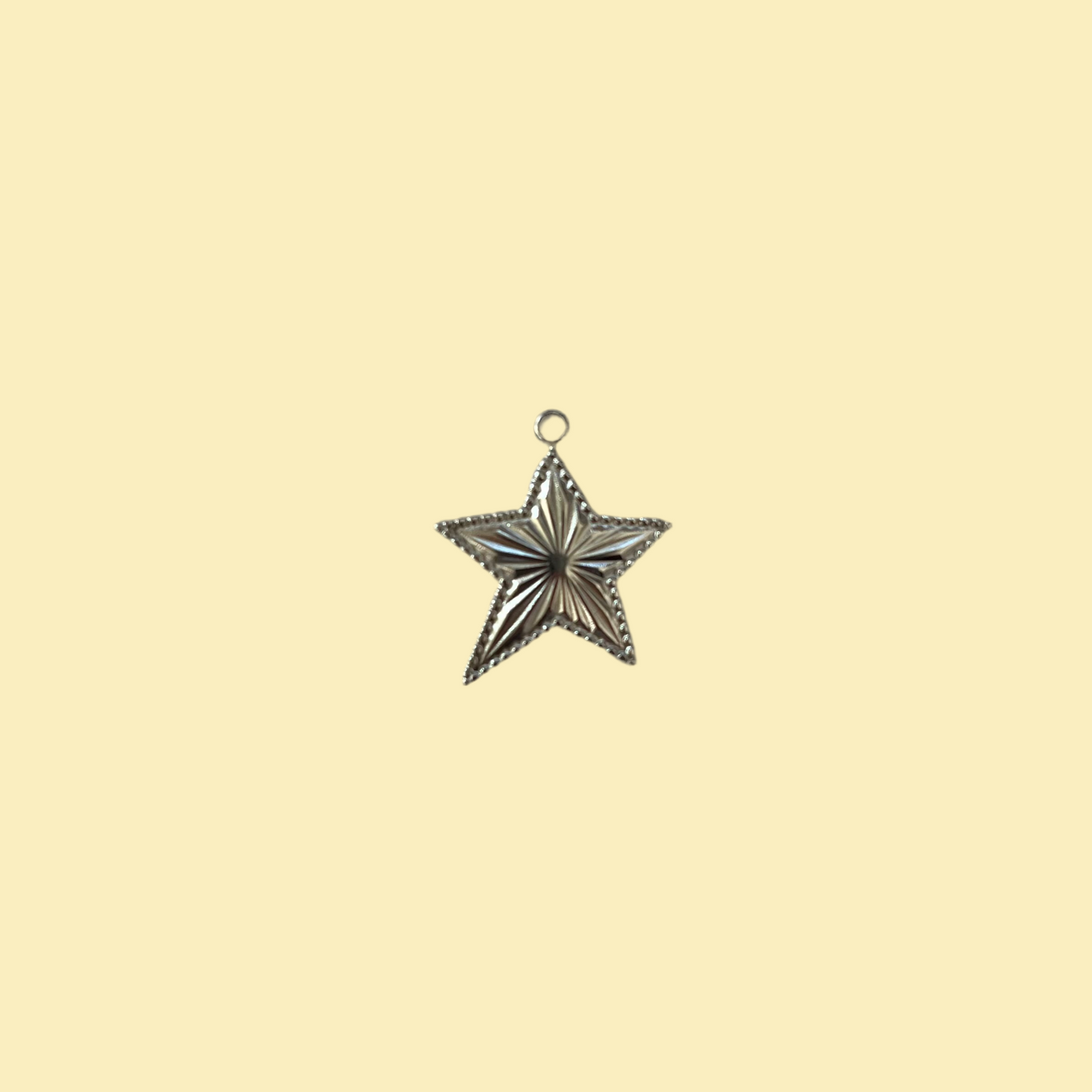 Asymmetrical star charm